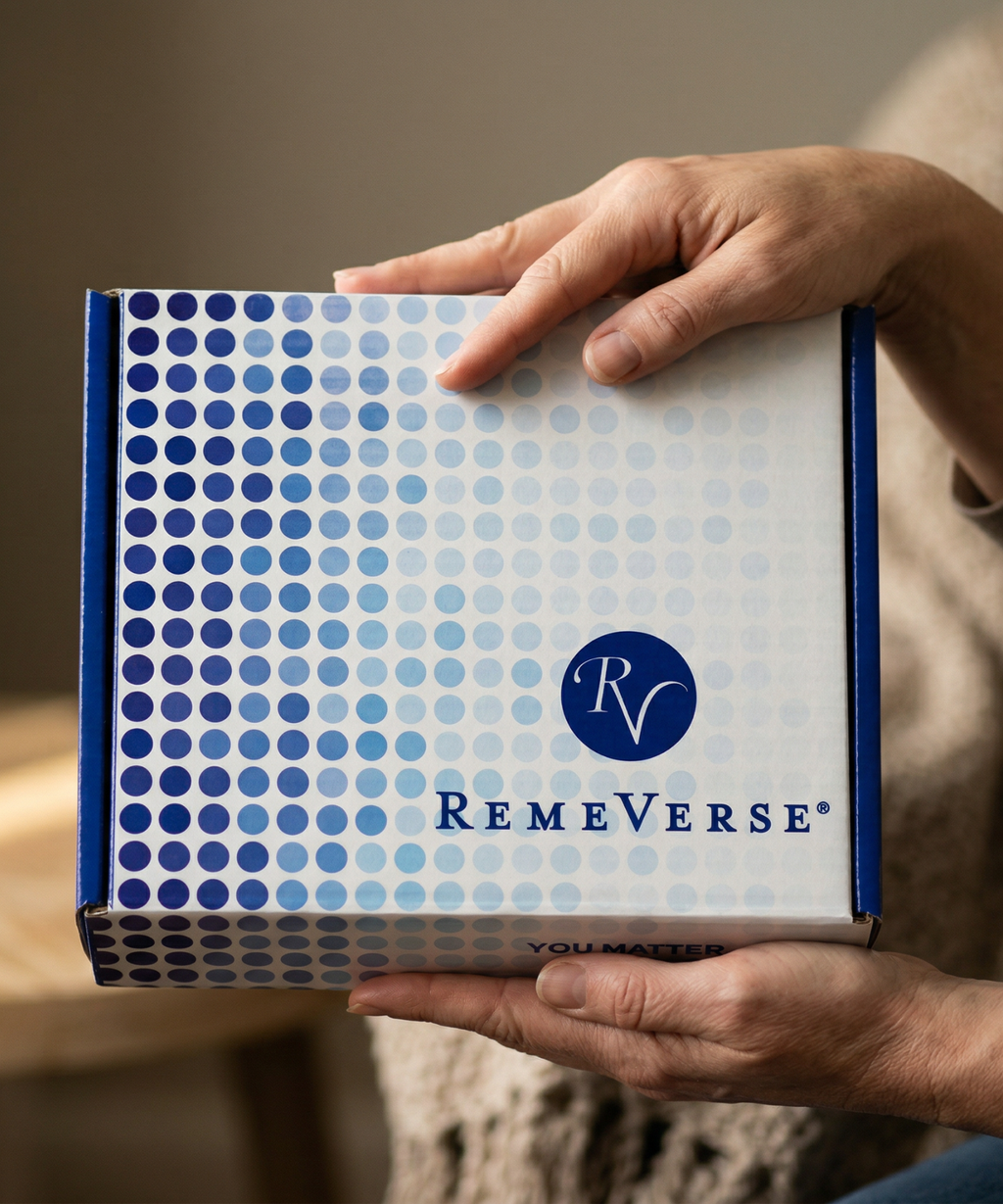 Hands holding the RemeVerse Chemo Care Kit gift box