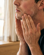 Man washing his face with RemeVerse Sulfate-Free Foaming Cleanser